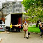 Moving crew unloading a truck during a local residential move in the Hudson Valley